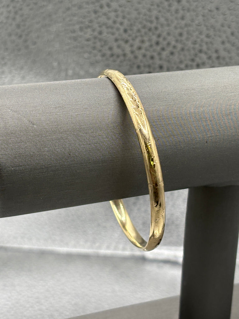 View one of Ladies 14 Karat Yellow Gold Engraved Bangle Bracelet