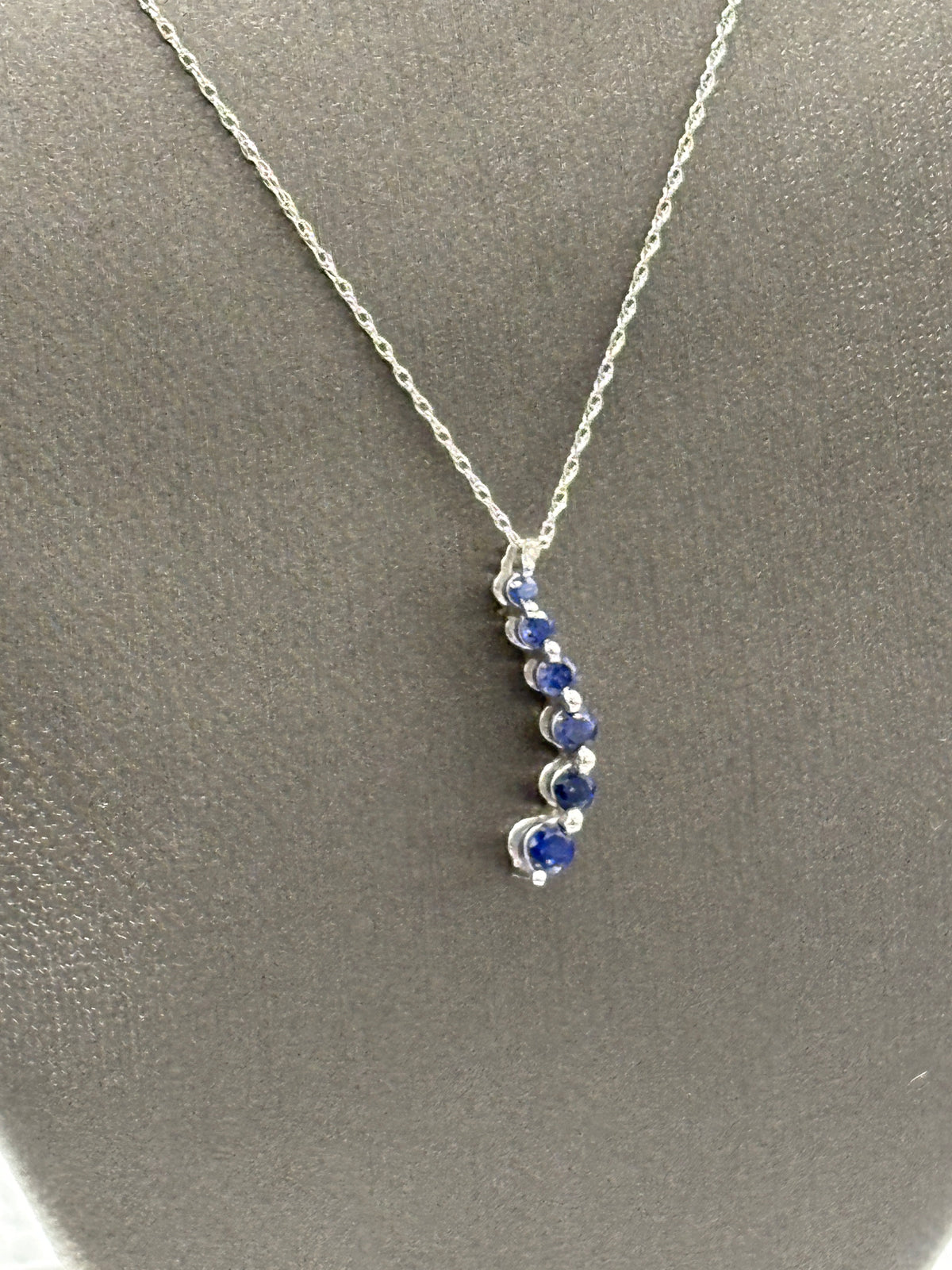 View one of Ladies 10 Karat White Gold Sapphire Journey Pendant & Chain