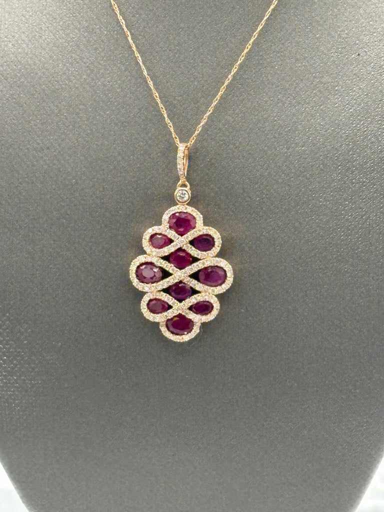 View two of Ladies 14 Karat Rose Gold Ruby/Diamond Pendant & Chain