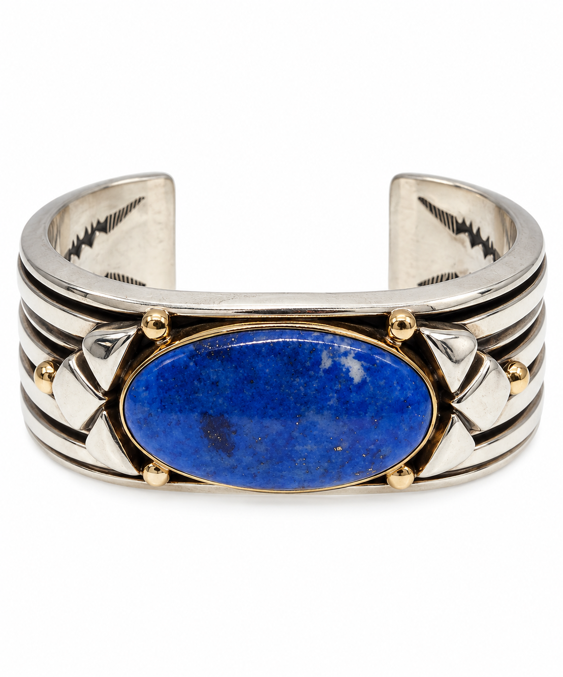Sterling silver cuff bracelet with lapis lazuli Cabochon on by Marita Gil.