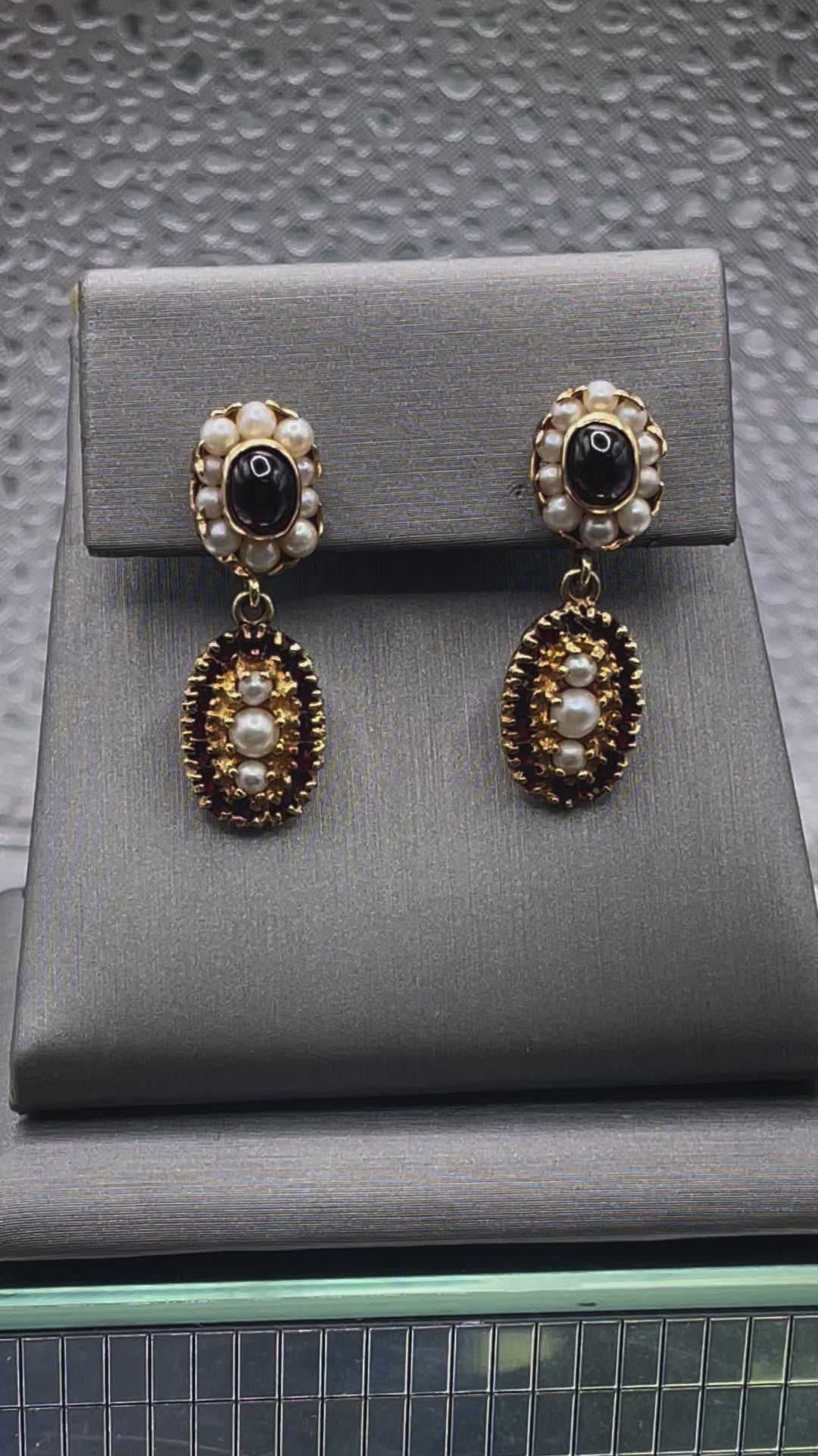 Movie two of Ladies Antique 14 Karat Solid Yellow Gold Cabochon Garnet and Pearl Earrings