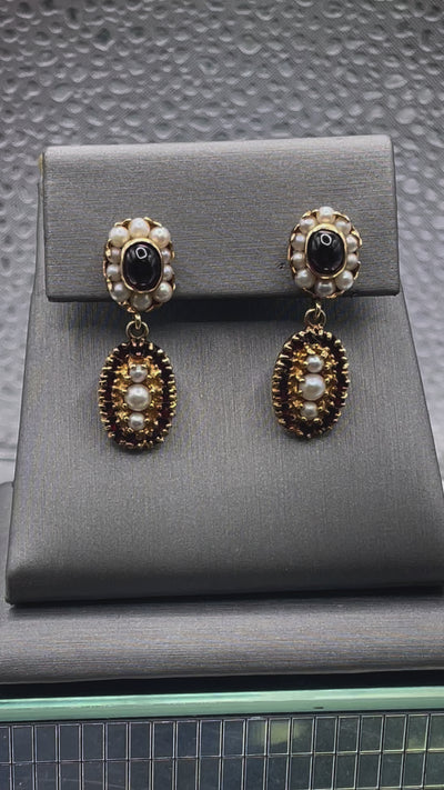 Movie two of Ladies Antique 14 Karat Solid Yellow Gold Cabochon Garnet and Pearl Earrings