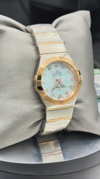 Ladies Omega Constellation 18 karat solid rose gold and stainless steel