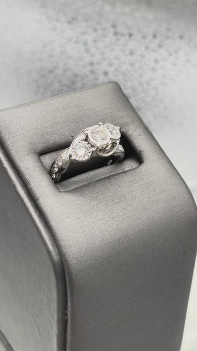 Movie of Ladies Fabulous 14 Karat White Gold Diamond Bi-Pass Ring