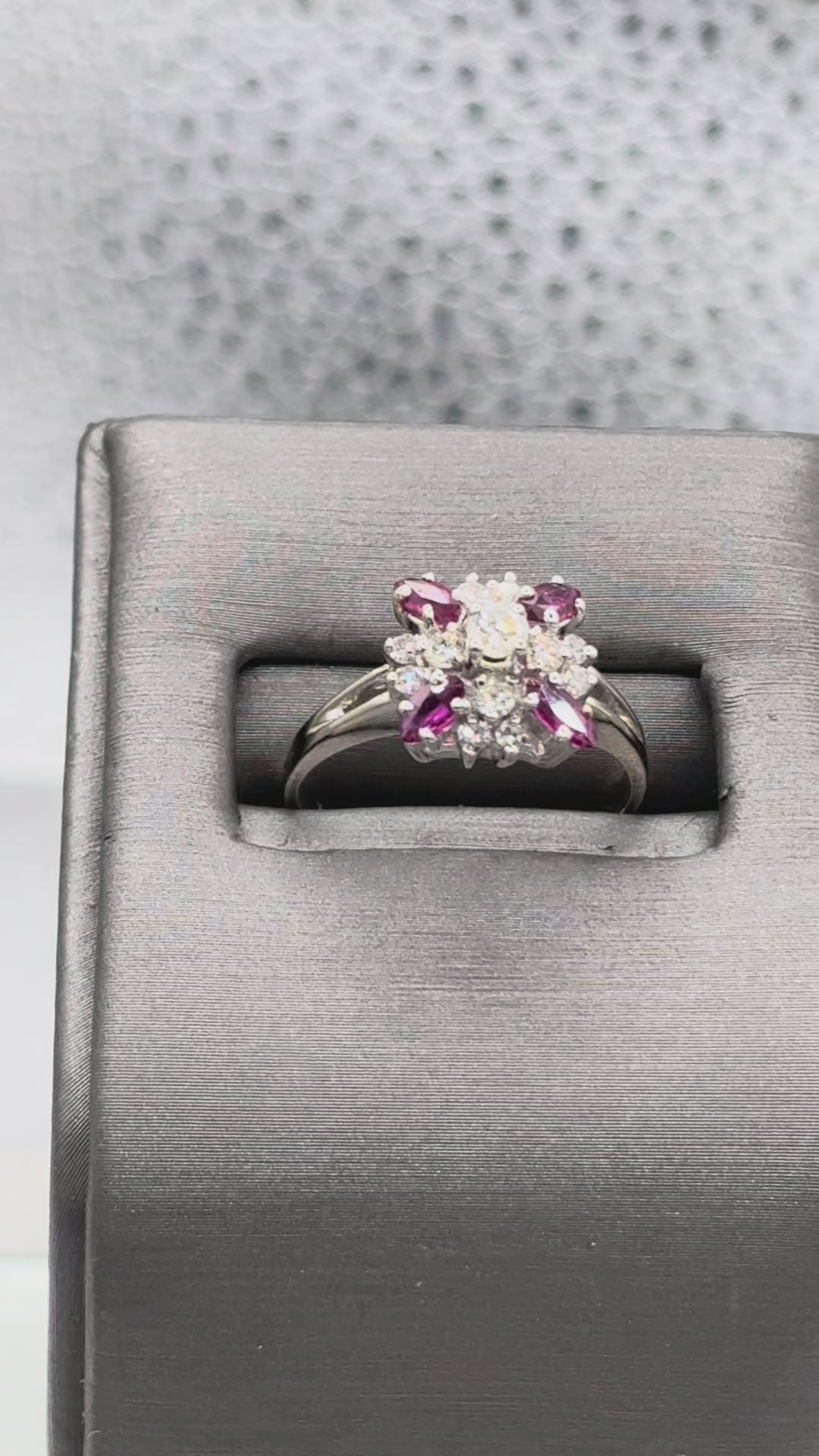 Movie of Ladies 14 Karat White Gold Ruby & Diamond Starburst Ring