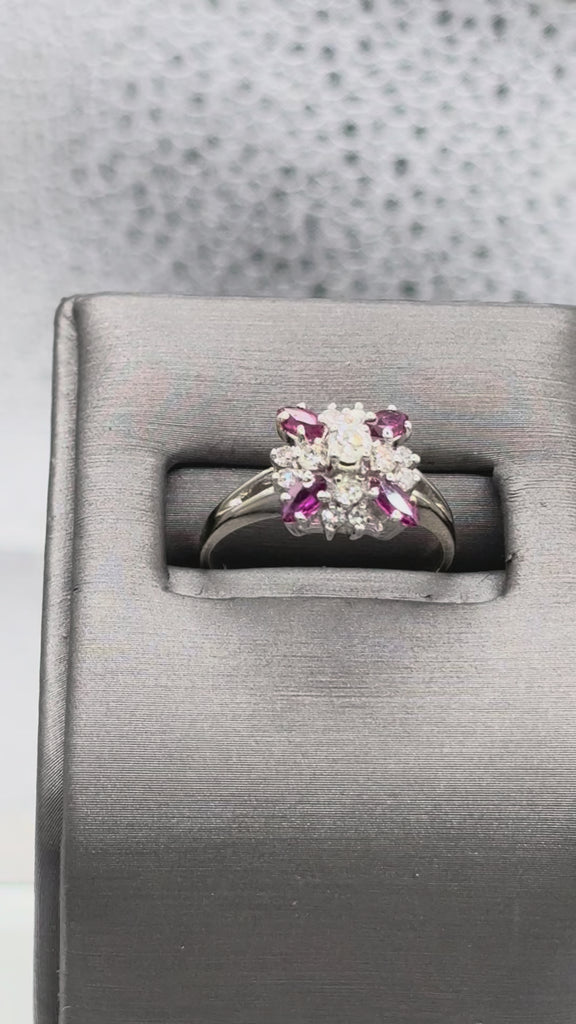 Movie of Ladies 14 Karat White Gold Ruby & Diamond Starburst Ring