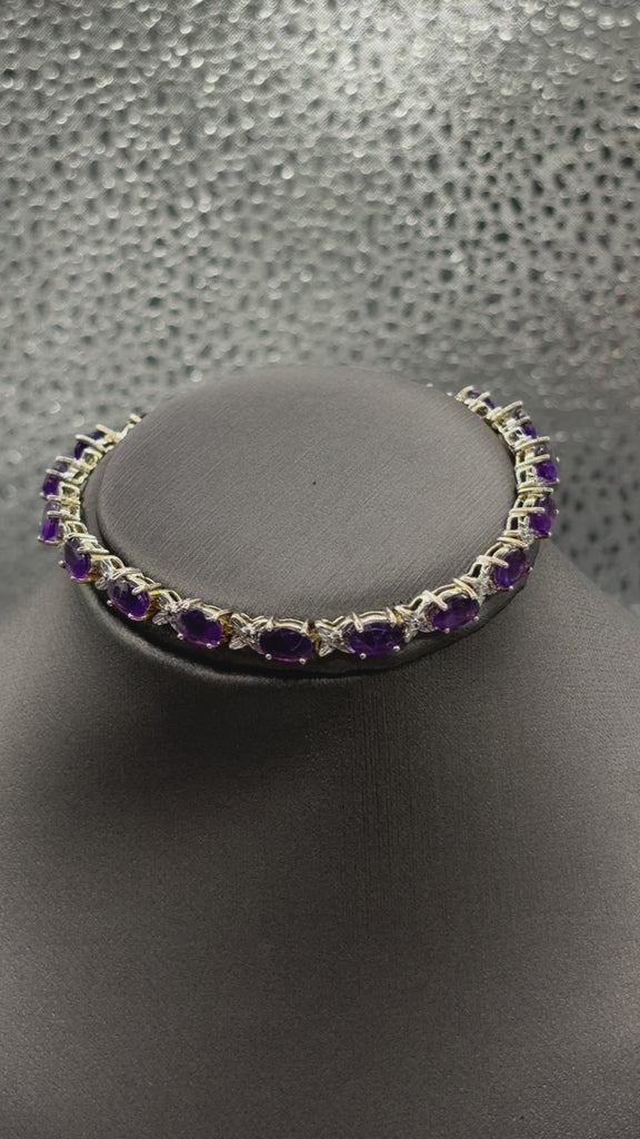 Movie of Ladies 10 Karat Yellow Gold Amethyst & Diamond XO Bracelet