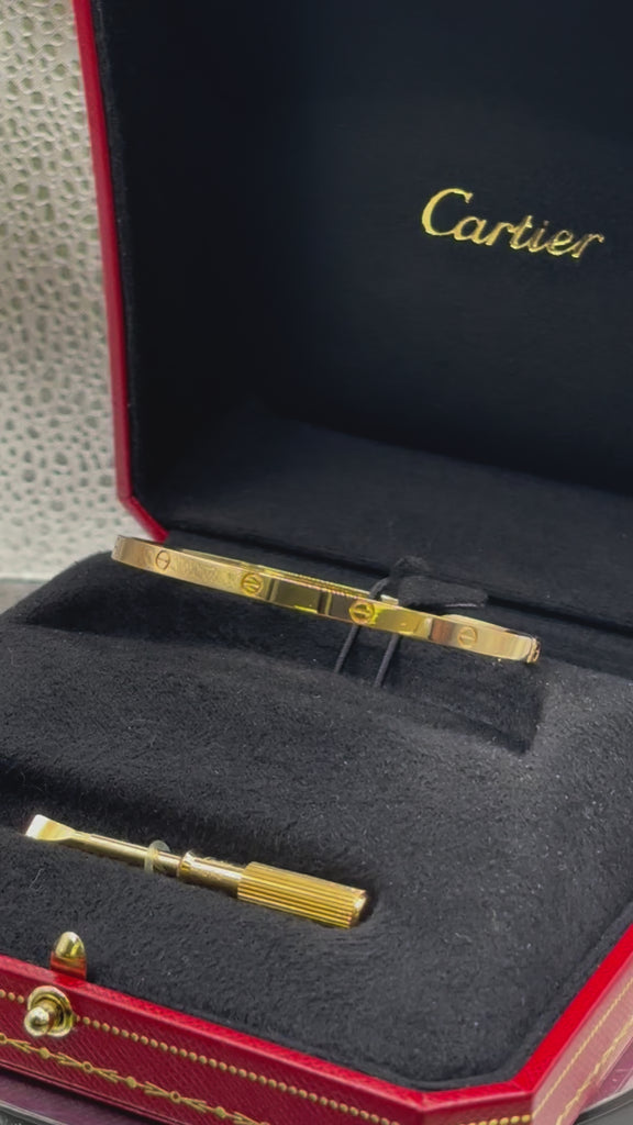 Movie of Authentic Cartier 18 Karat Yellow Gold Love Bangle Bracelet