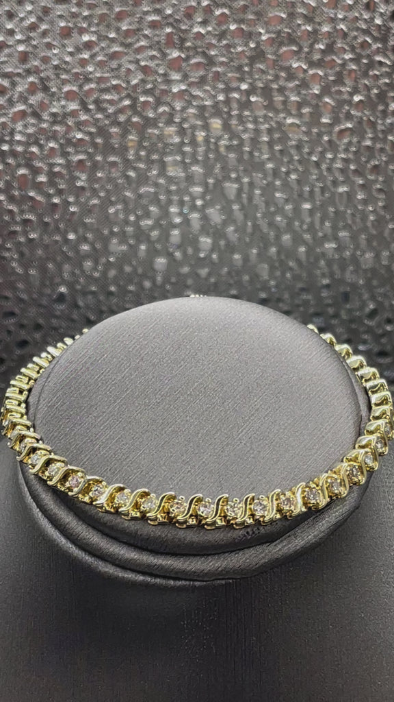 Movie of Ladies 14 Karat Solid Yellow Gold Diamond Tennis Bracelet