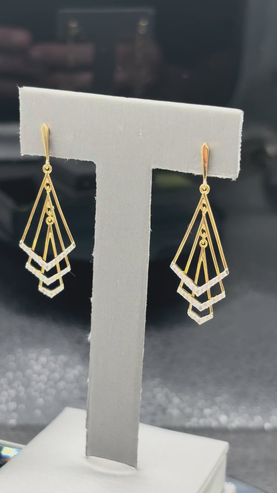 18kt Yellow gold ladies diamond dangling earrings with a geometric, kinetic shape with diamond accents