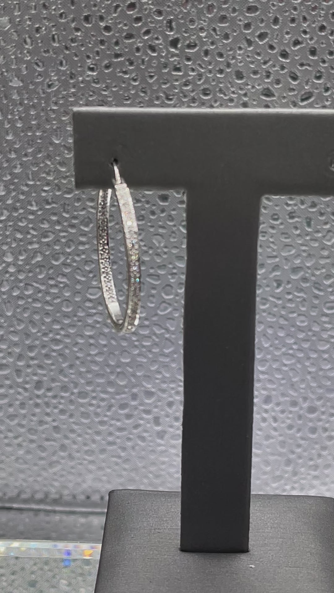 Movie of 14 Karat White Gold Single Pierced Diamond Inside Out Hoop Earring