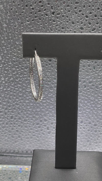 Movie of 14 Karat White Gold Single Pierced Diamond Inside Out Hoop Earring