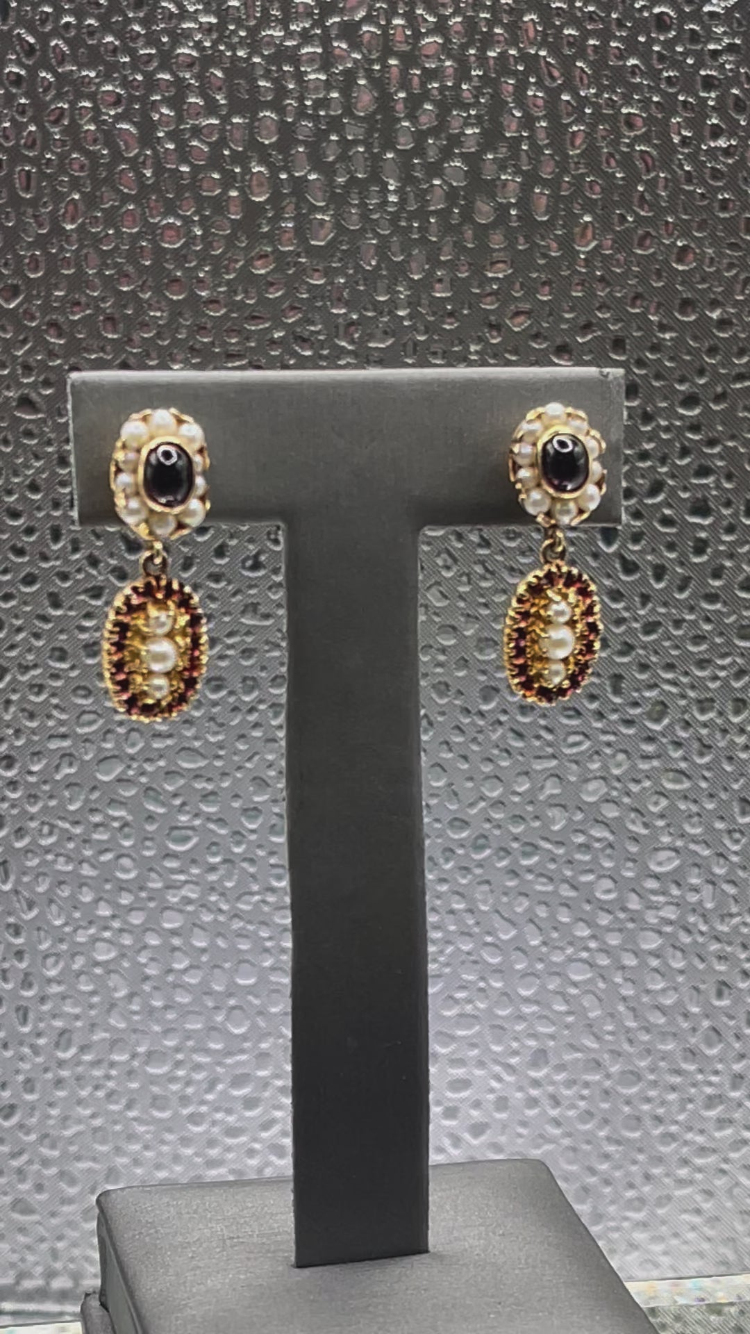 Movie of Ladies Antique 14 Karat Solid Yellow Gold Cabochon Garnet and Pearl Earrings
