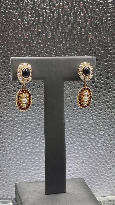 Movie of Ladies Antique 14 Karat Solid Yellow Gold Cabochon Garnet and Pearl Earrings