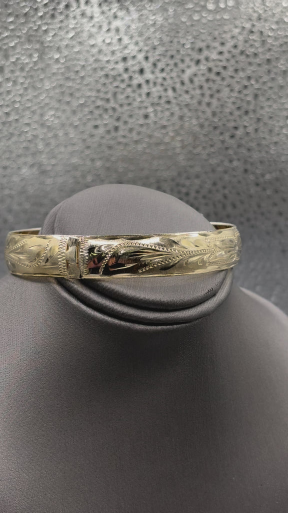 Movie of Ladies 14 Karat Yellow Gold Fancy Oversized Bangle Bracelet