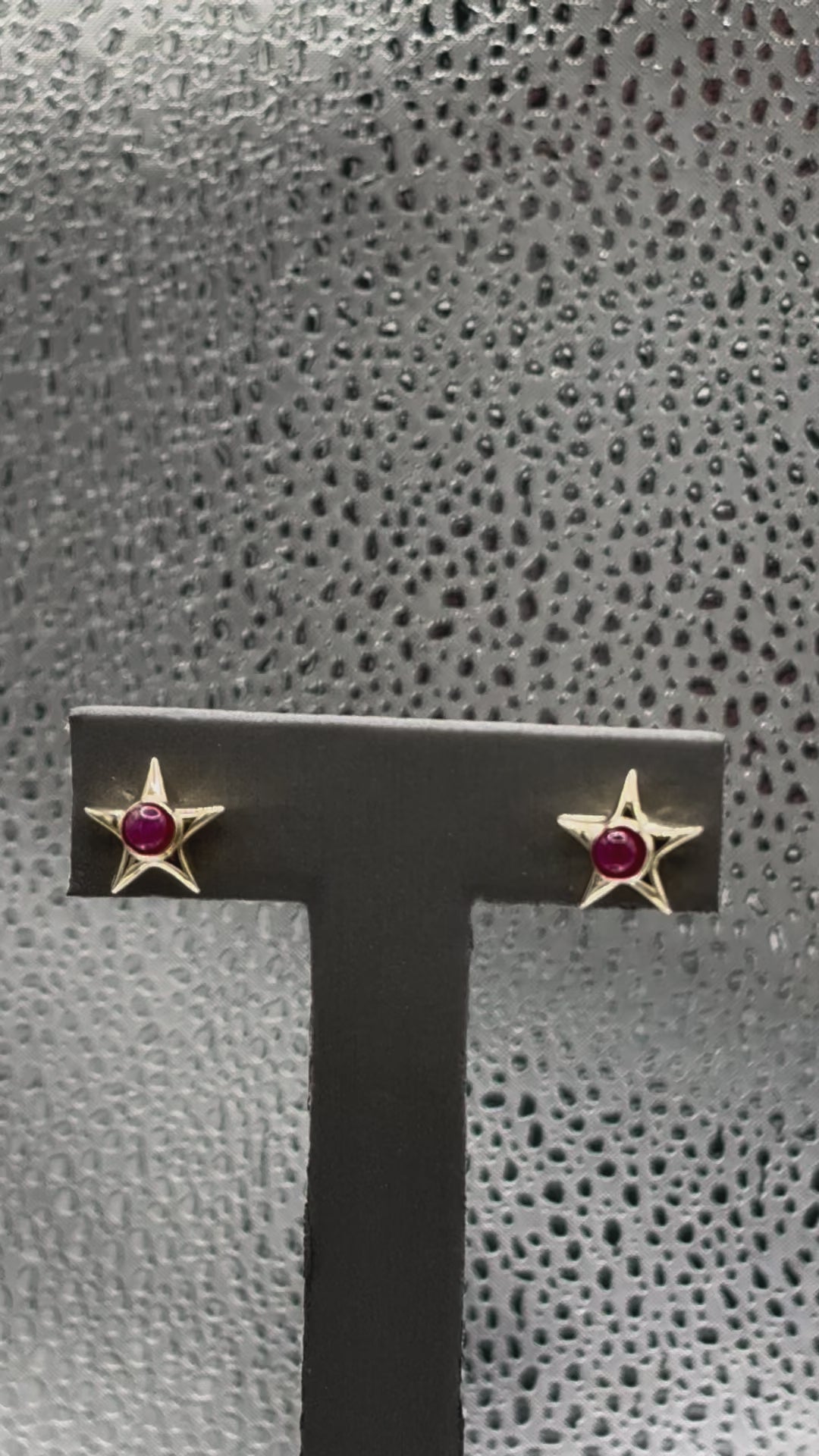 Movie of Ladies 14 Karat Yellow Gold Ruby Star Earrings