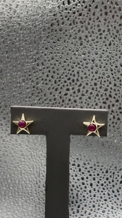 Movie of Ladies 14 Karat Yellow Gold Ruby Star Earrings