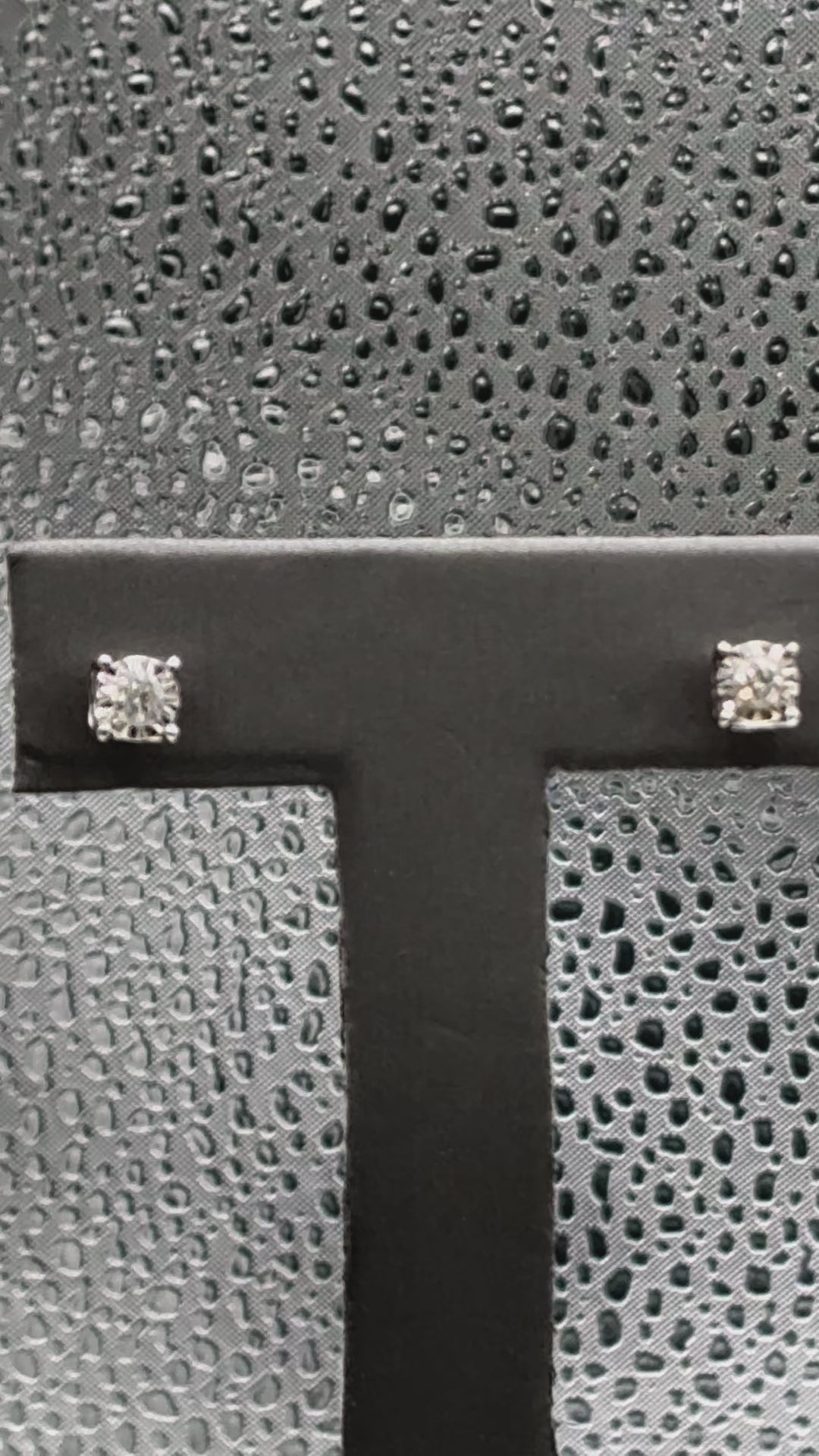 Movie of Ladies 14 Karat White Gold Miracle Diamond Stud Earrings