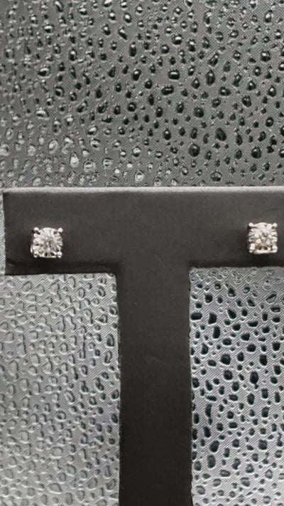 Movie of Ladies 14 Karat White Gold Miracle Diamond Stud Earrings
