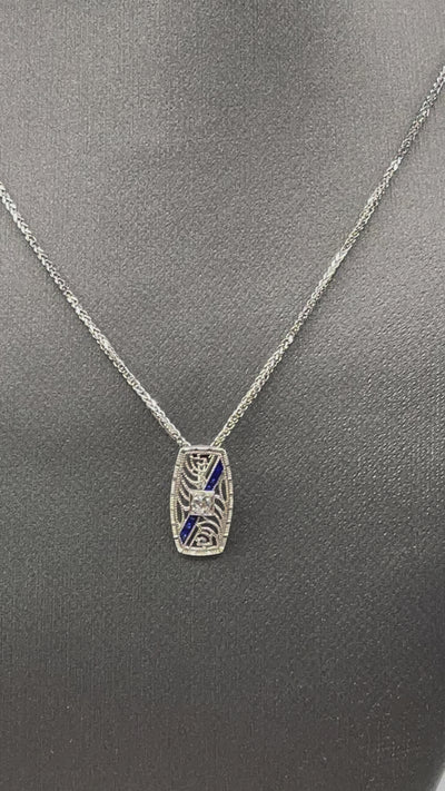 Movie of Ladies Antique 14 Karat White Gold Sapphire Enamel & Diamond Pendant