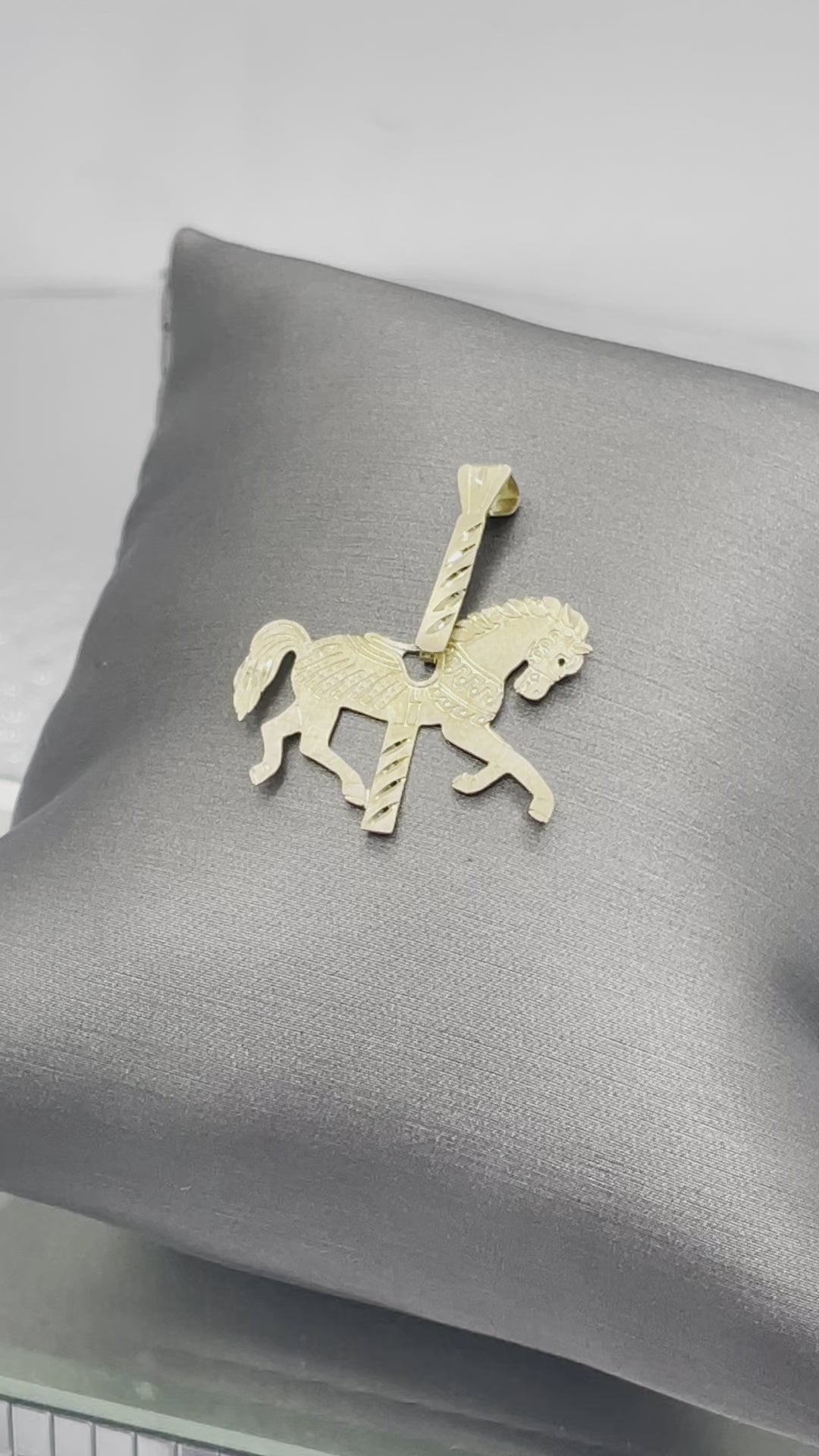 A Ladies Vintage Michael Anthony14 Karat Yellow Gold Carousel Horse Pendant