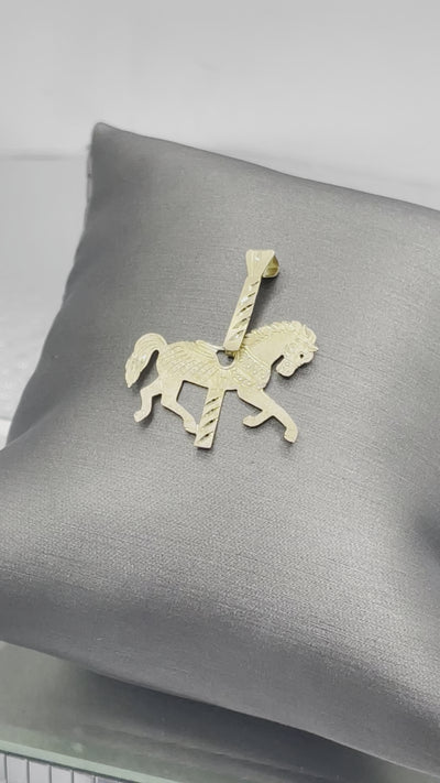 A Ladies Vintage Michael Anthony14 Karat Yellow Gold Carousel Horse Pendant
