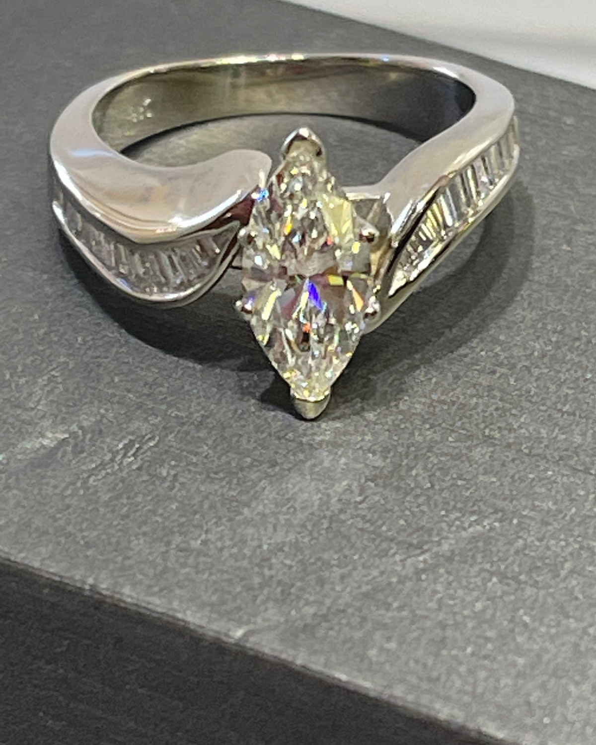 14 Karat White Gold Marquise Shaped Diamond Engagement Ring With Tapered Baguettes