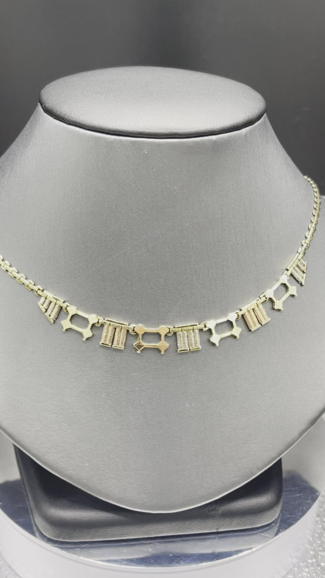 Movie of 14 Karat Tri-Colored Gold Grecian Necklace