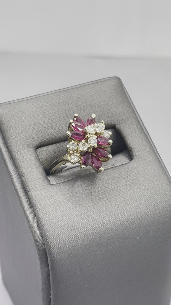 Movie of 14 Karat Yellow Gold Marquise Ruby And Round Diamond Cluster Statement Ring