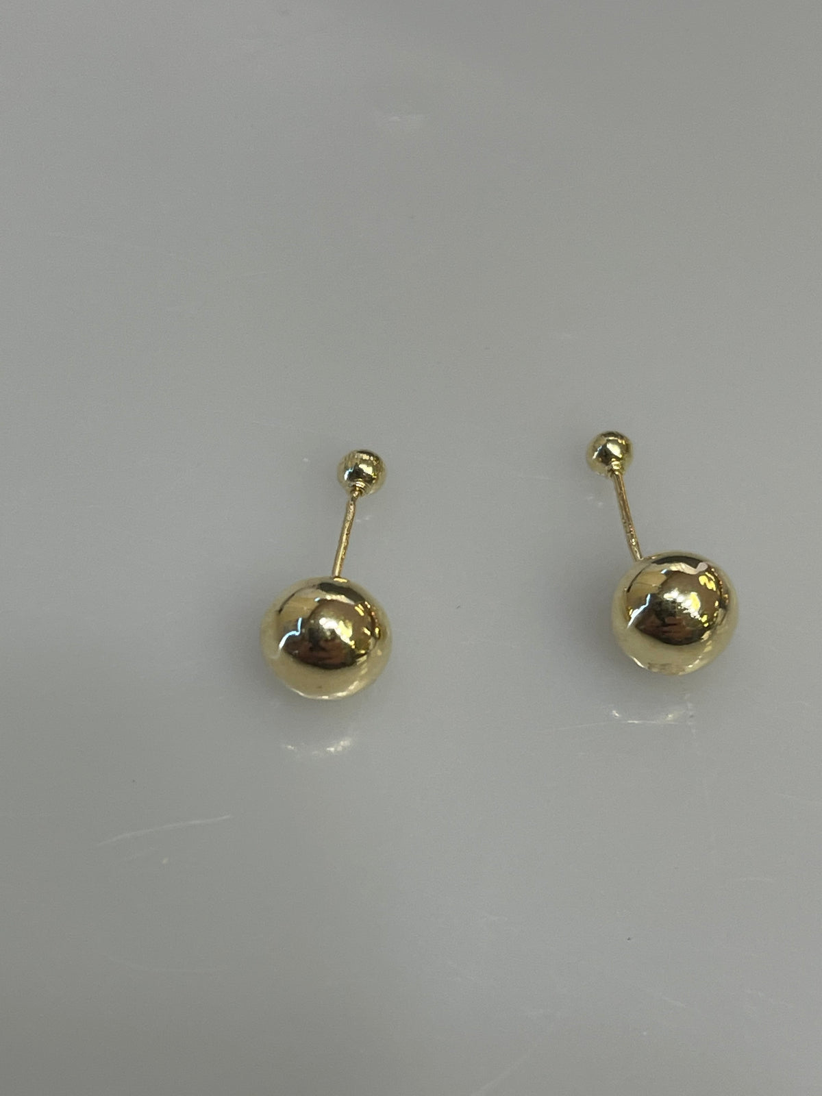 View three of 14 Karat Yellow Gold Double Ball Pierced Earrings