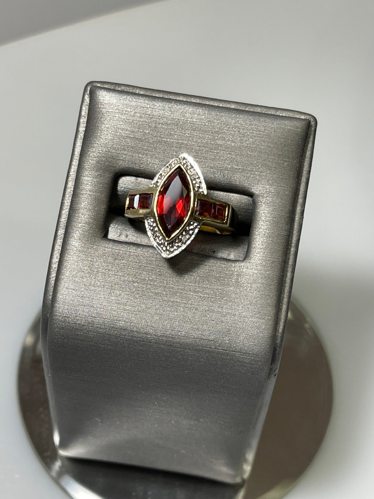 View two of 10 Karat Yellow Gold Garnet And Diamond Accent Ring