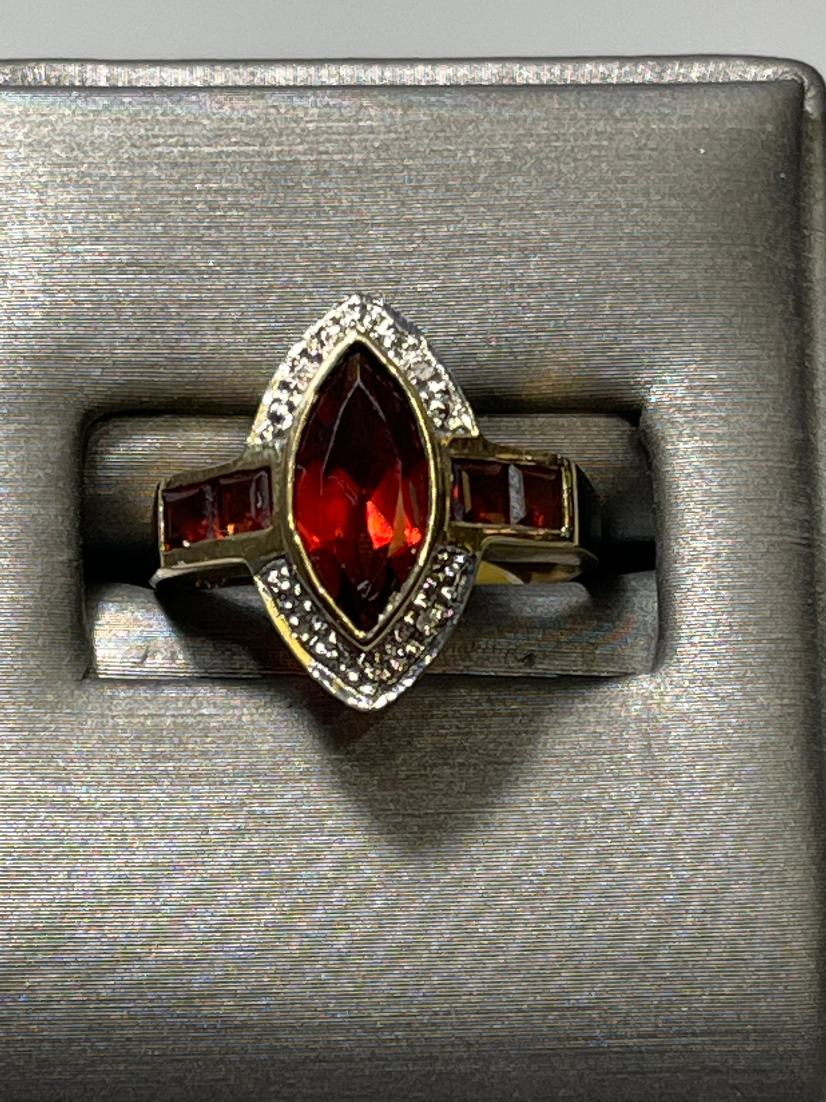 View seven of 10 Karat Yellow Gold Garnet And Diamond Accent Ring