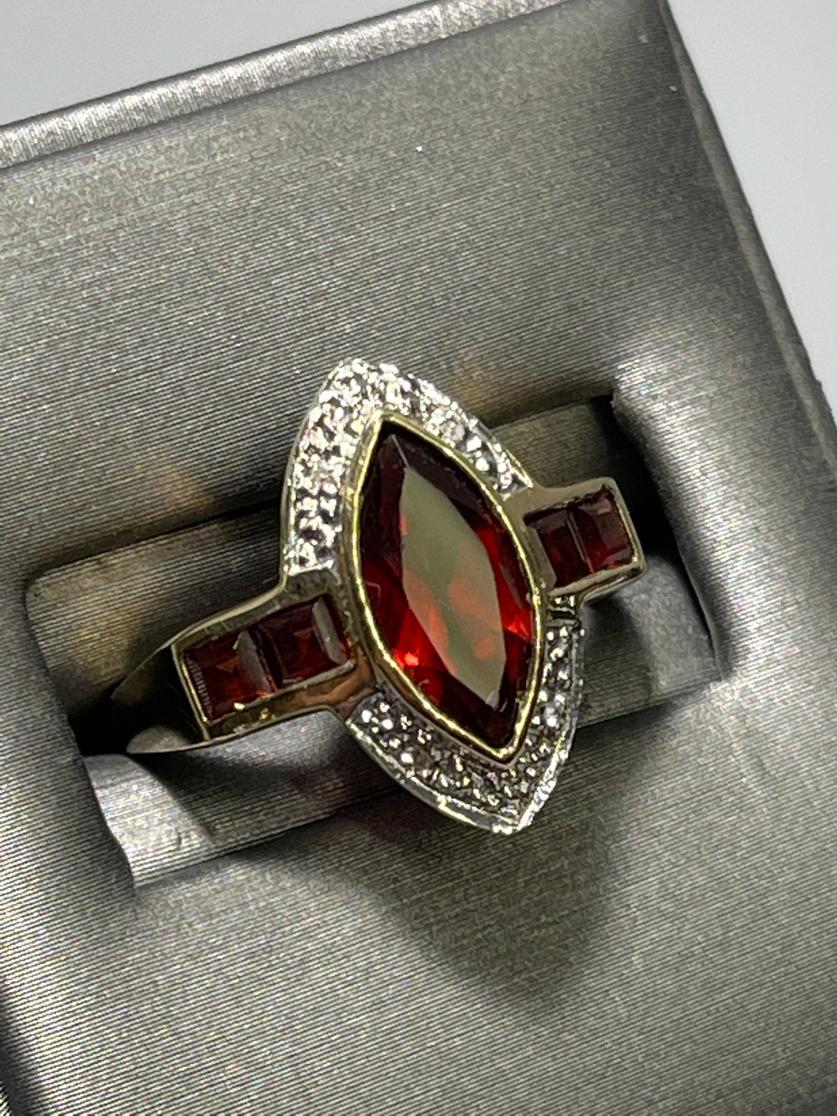 View eight of 10 Karat Yellow Gold Garnet And Diamond Accent Ring