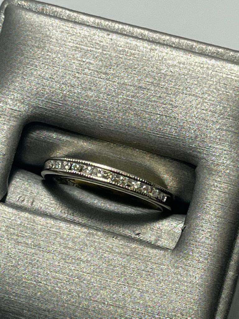 side view of 14 Karat White Gold Diamond Band With Millgrain Edging