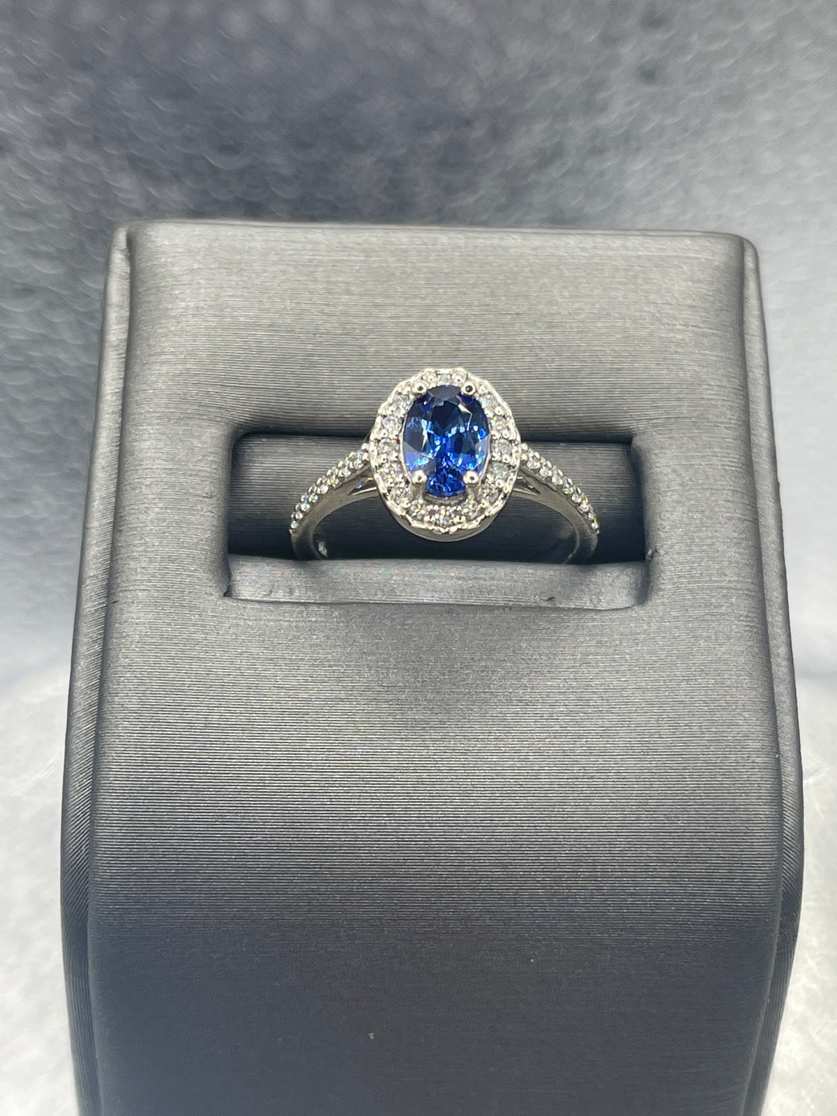 An Exceptional Ladies 14 Karat Gold Sapphire & Diamond Halo Ring