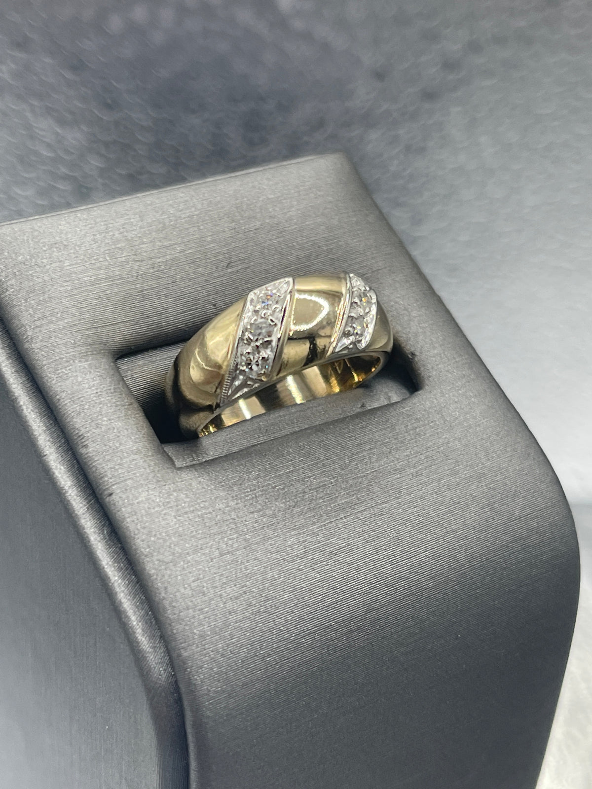 A Beautiful Ladies 14 Karat Gold Dome Style Ring with Angled Diamond Bars