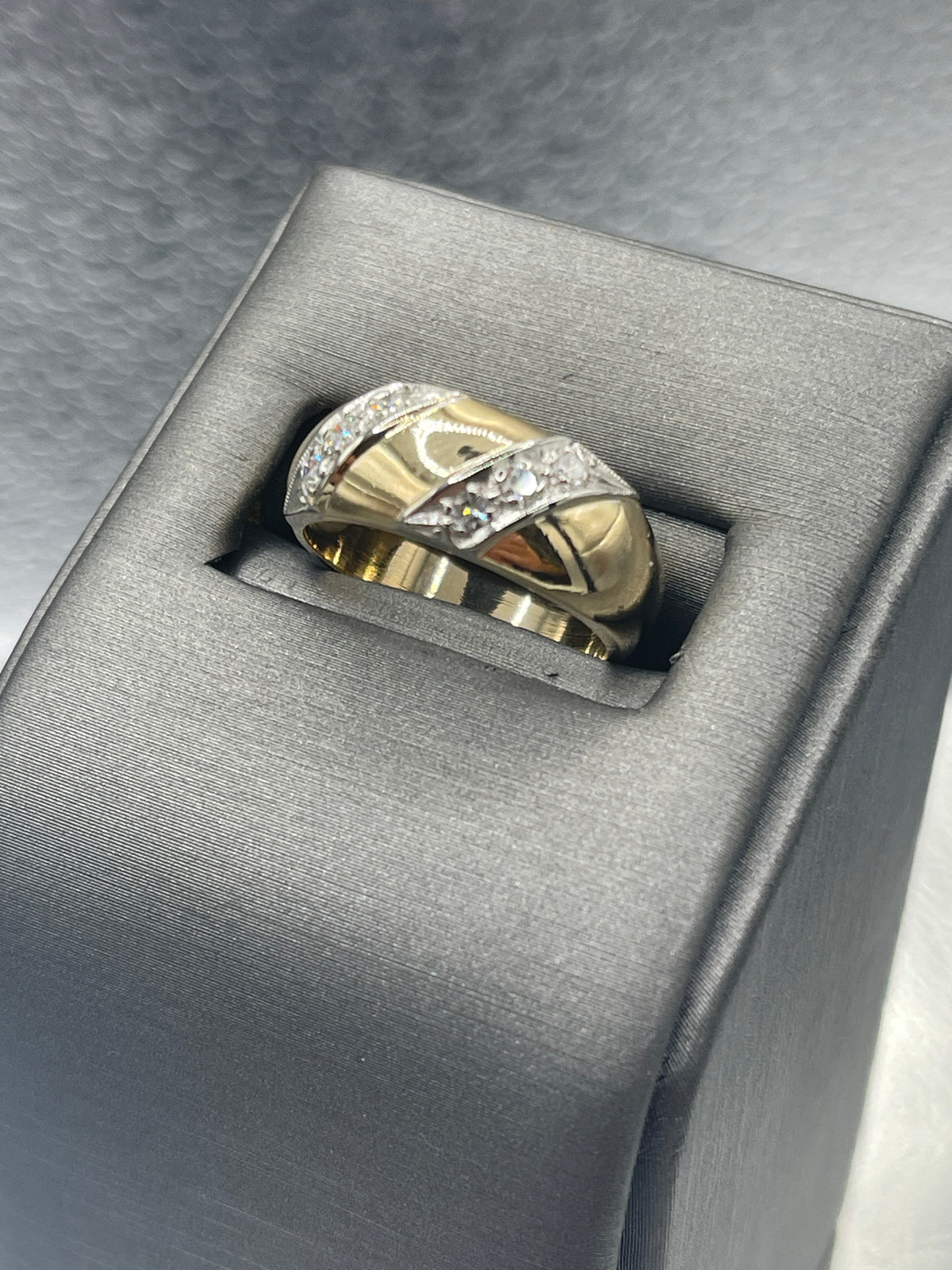 A Beautiful Ladies 14 Karat Gold Dome Style Ring with Angled Diamond Bars