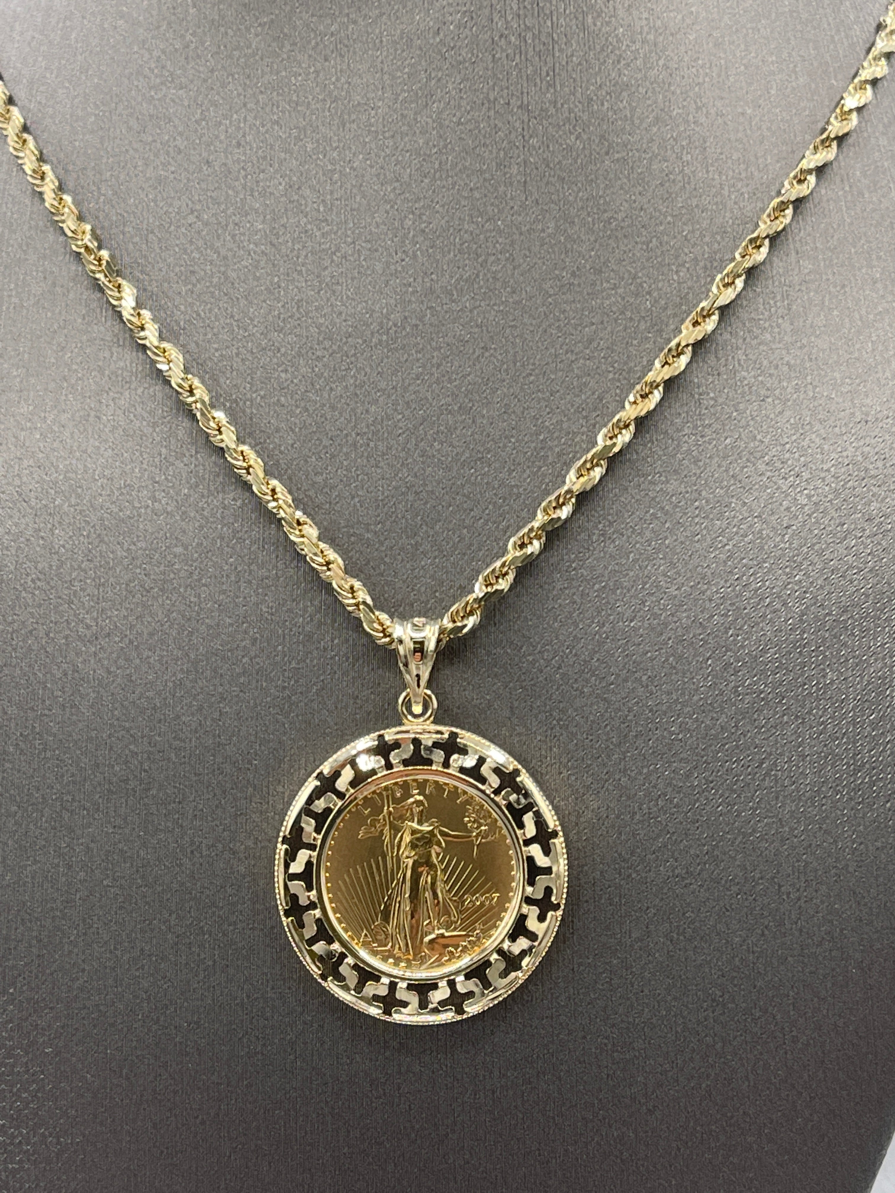 A 2007 United States Gold 1/10th oz Gold Eagle Coin Pendant