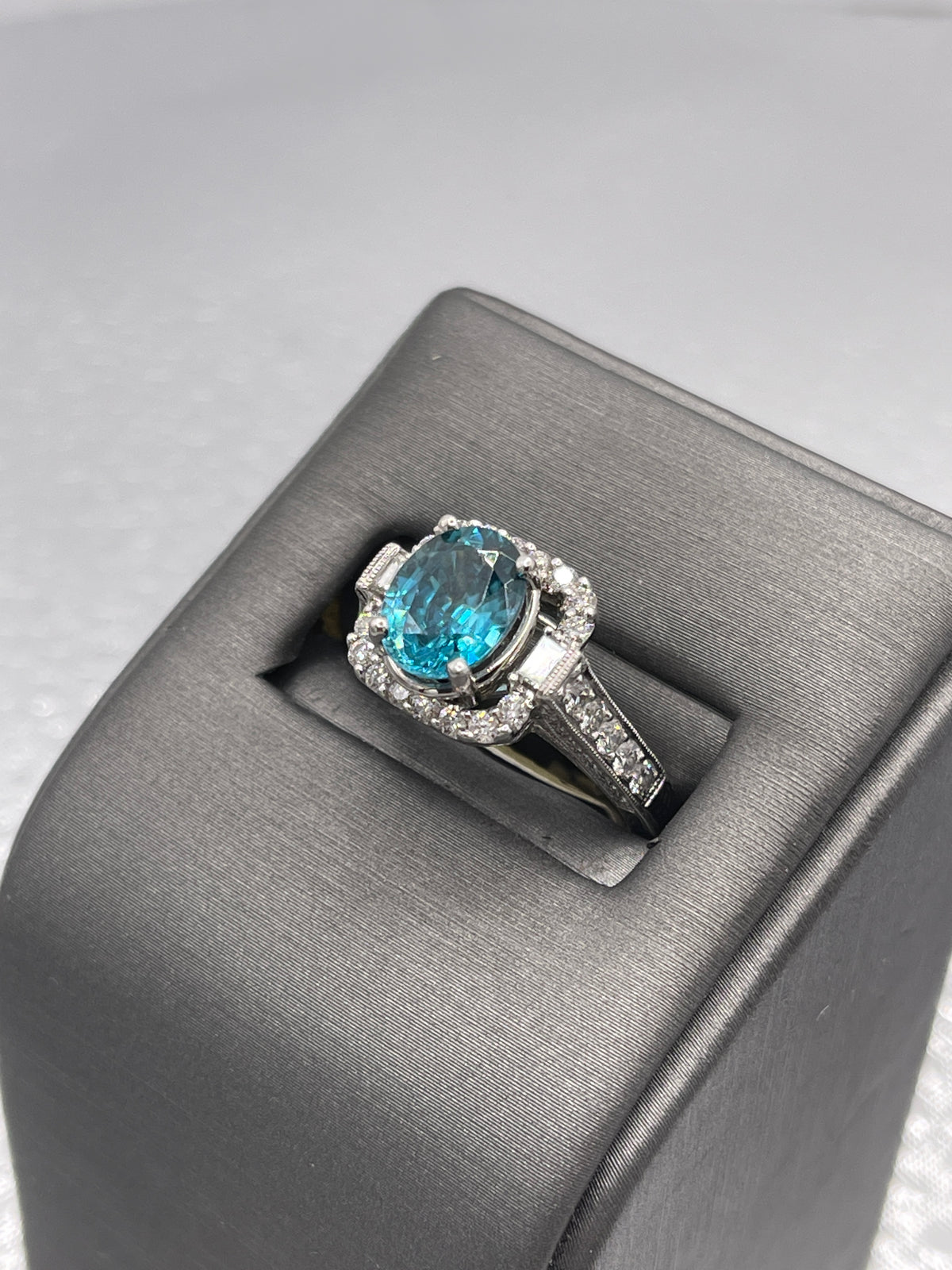 14 Karat White Gold 2 Carat Oval Blue Topaz With Baguettes & Round Diamonds Ring