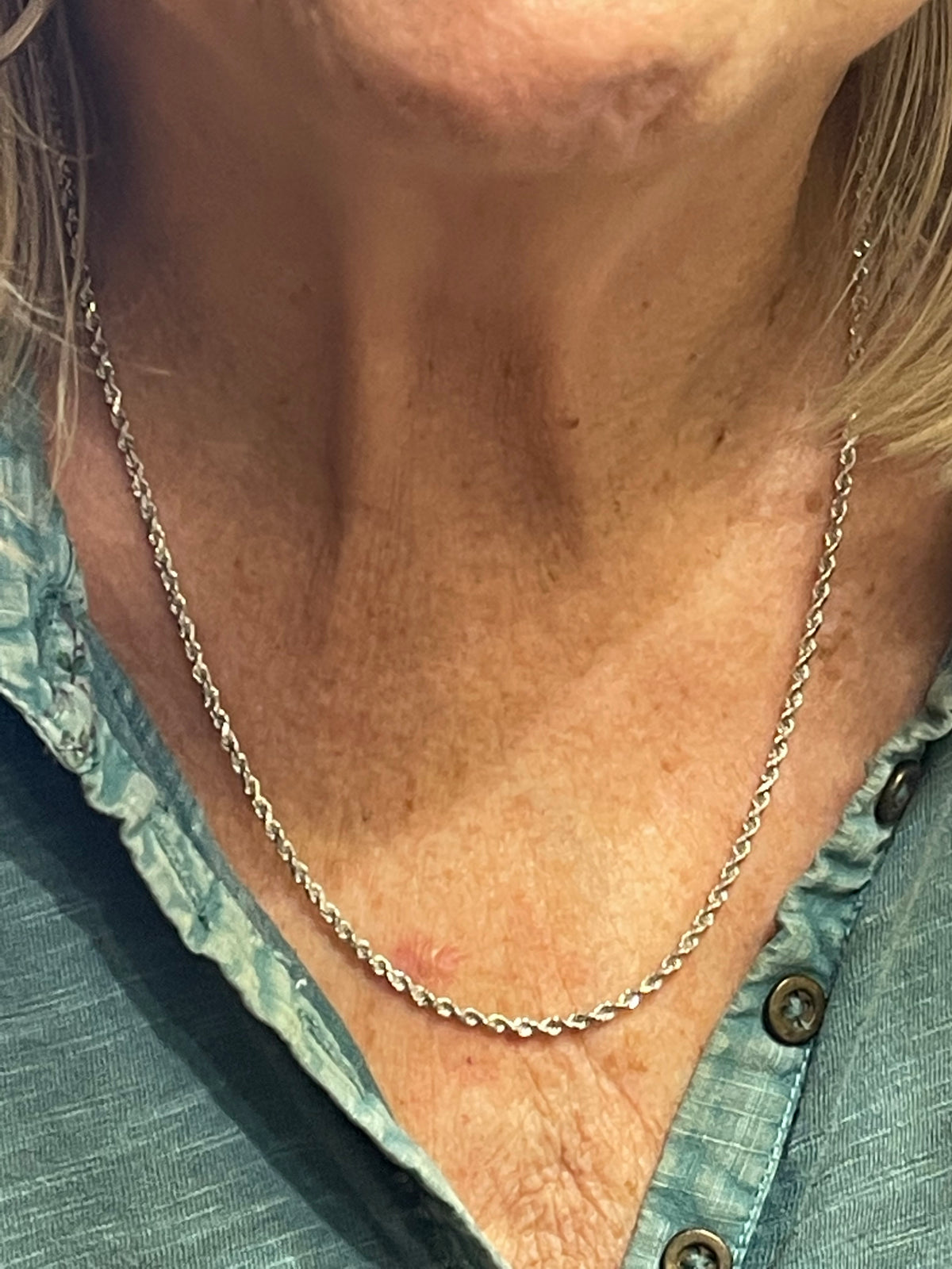 View ten of 14 Karat Yellow Gold Diamond Cut Rope Chain