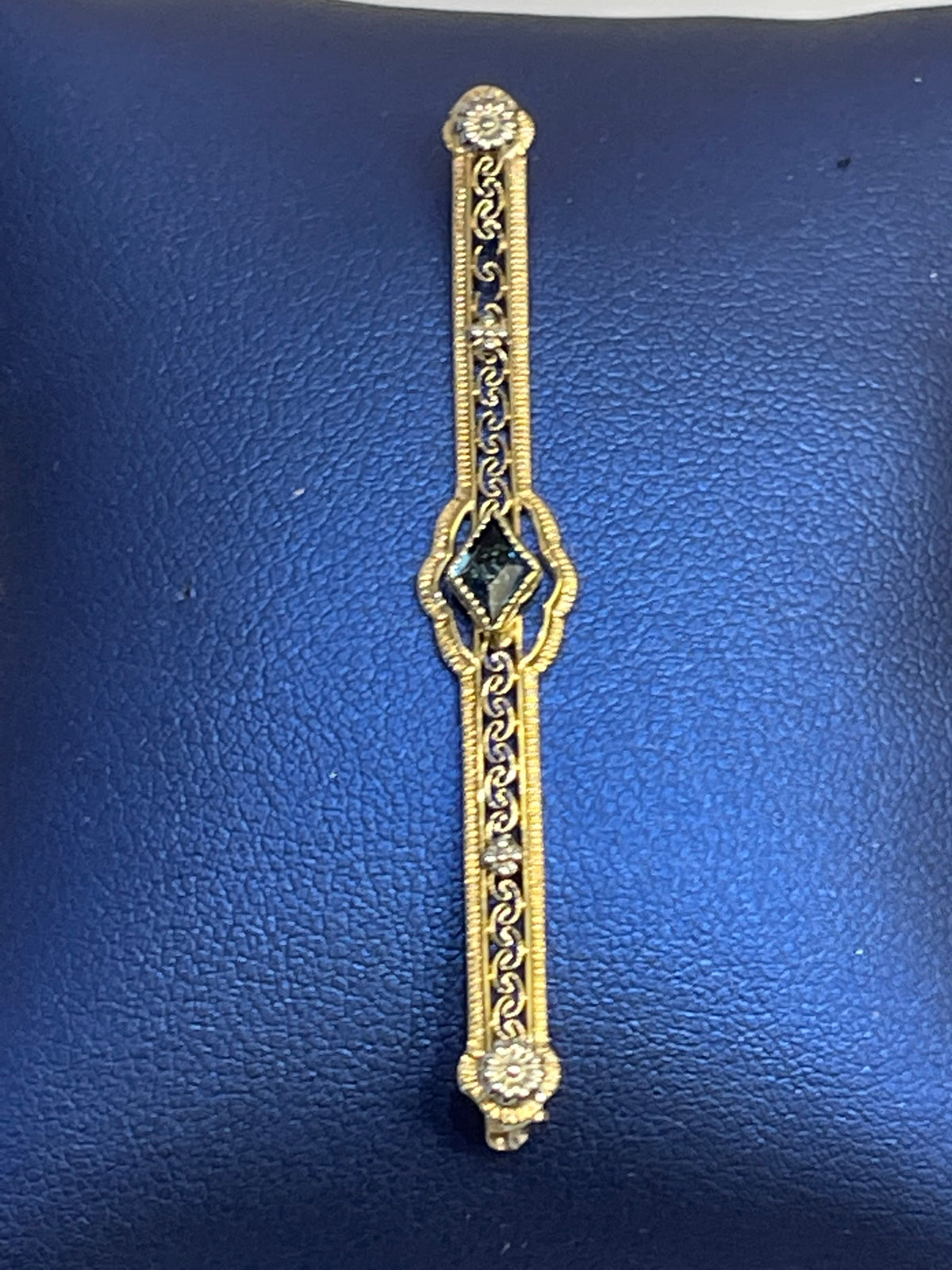 View one of 14 KARAT YELLOW GOLD, SAPPHIRE AND DIAMOND PIN