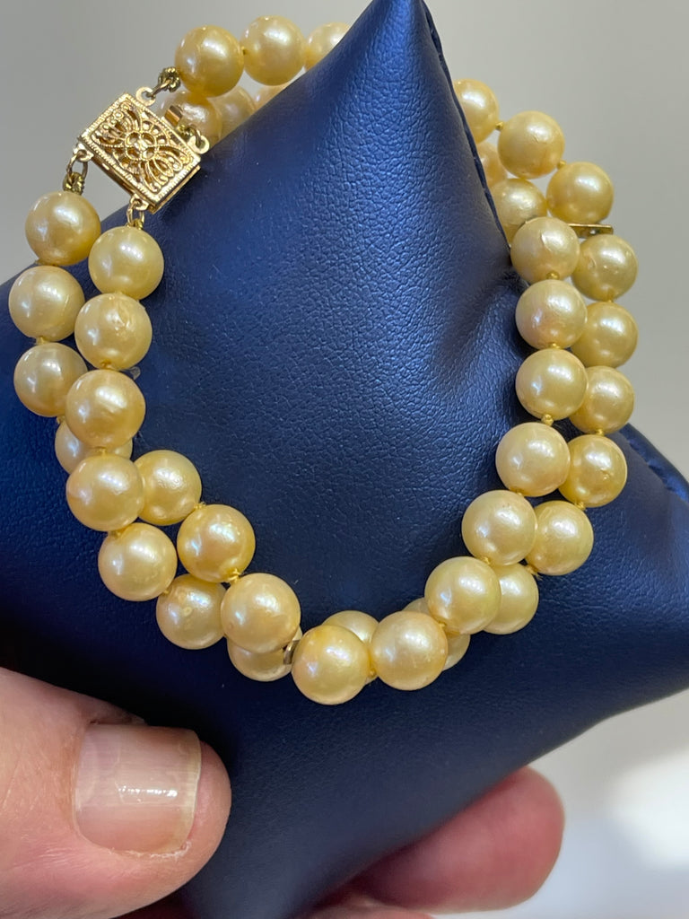 View two of 14 KARAT YELLOW GOLD AND DOUBLE STRAND PEARL BRACELET