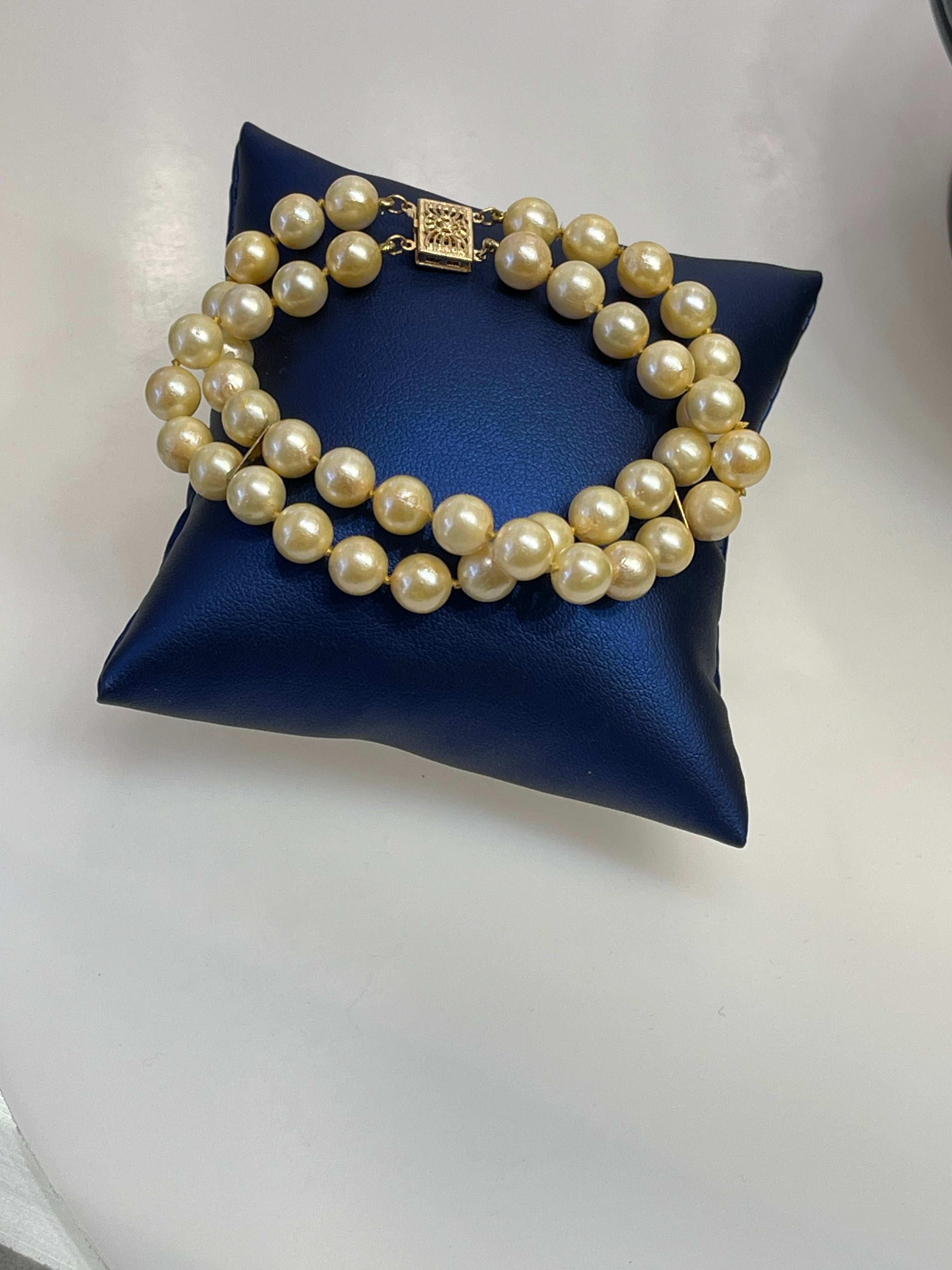 14 Karat Yellow Gold and Double Strand Pearl Bracelet