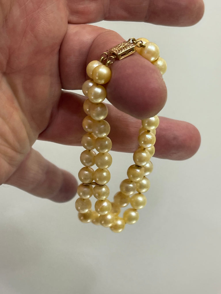 View seven of 14 KARAT YELLOW GOLD AND DOUBLE STRAND PEARL BRACELET