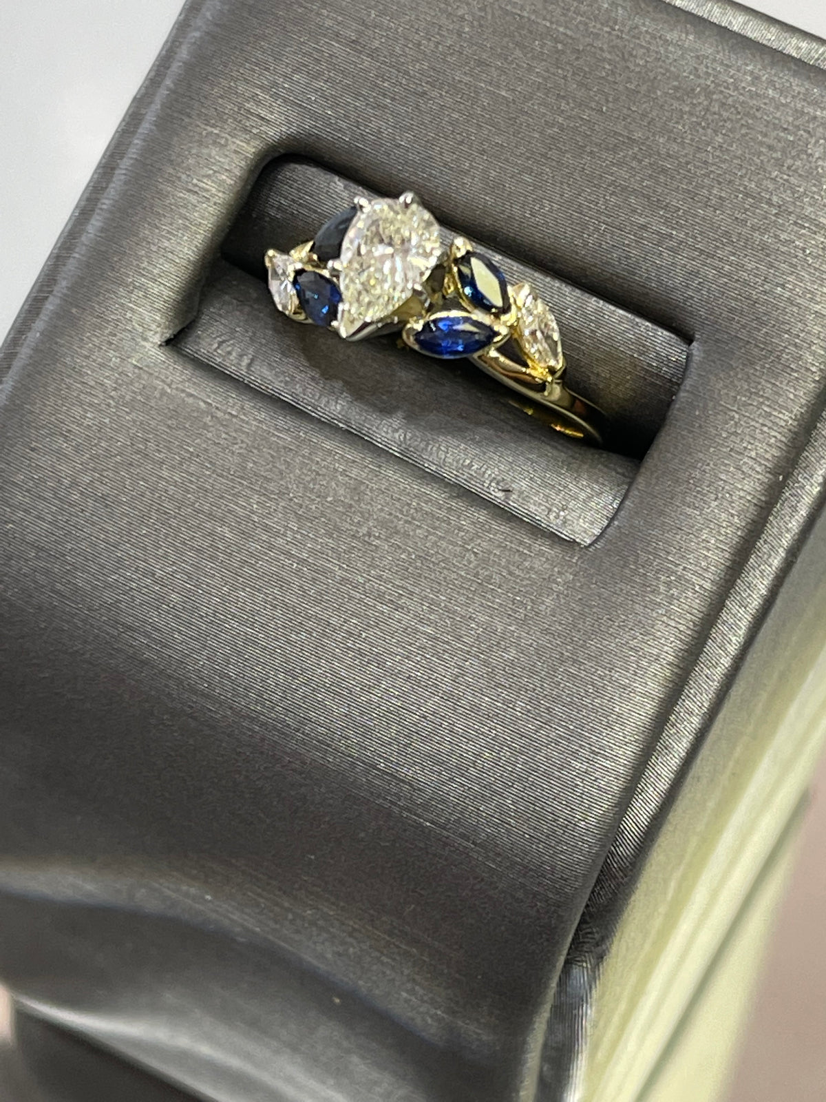 18KT Yellow Gold Custom Designed Pear Shaped Diamond And Marquise Sapphire Engagement Ring