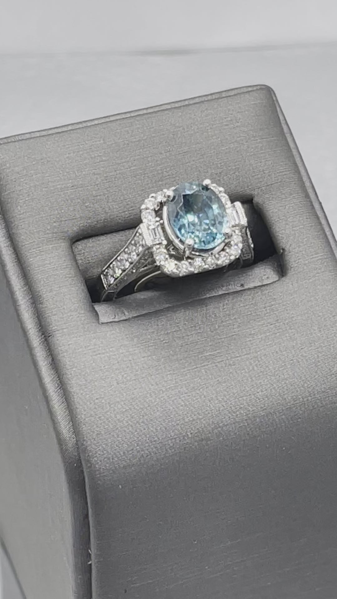 14 Karat White Gold 2 Carat Oval Blue Topaz With Baguettes & Round Diamonds Ring