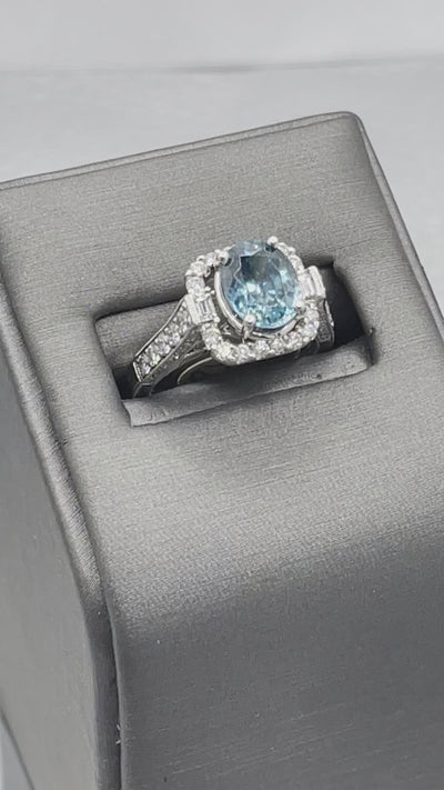 14 Karat White Gold 2 Carat Oval Blue Topaz With Baguettes & Round Diamonds Ring