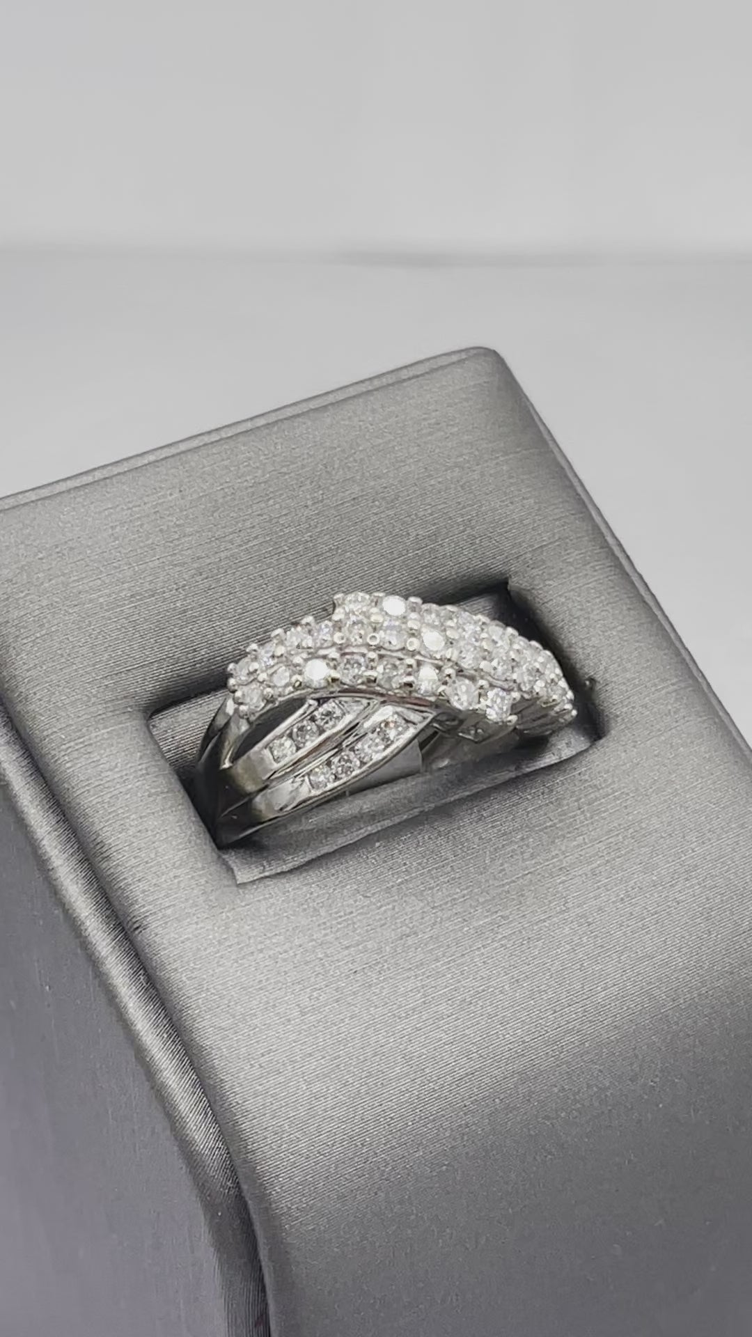 movie of 10 Karat White Gold Channel Set Criss Cross Design Diamond Ring