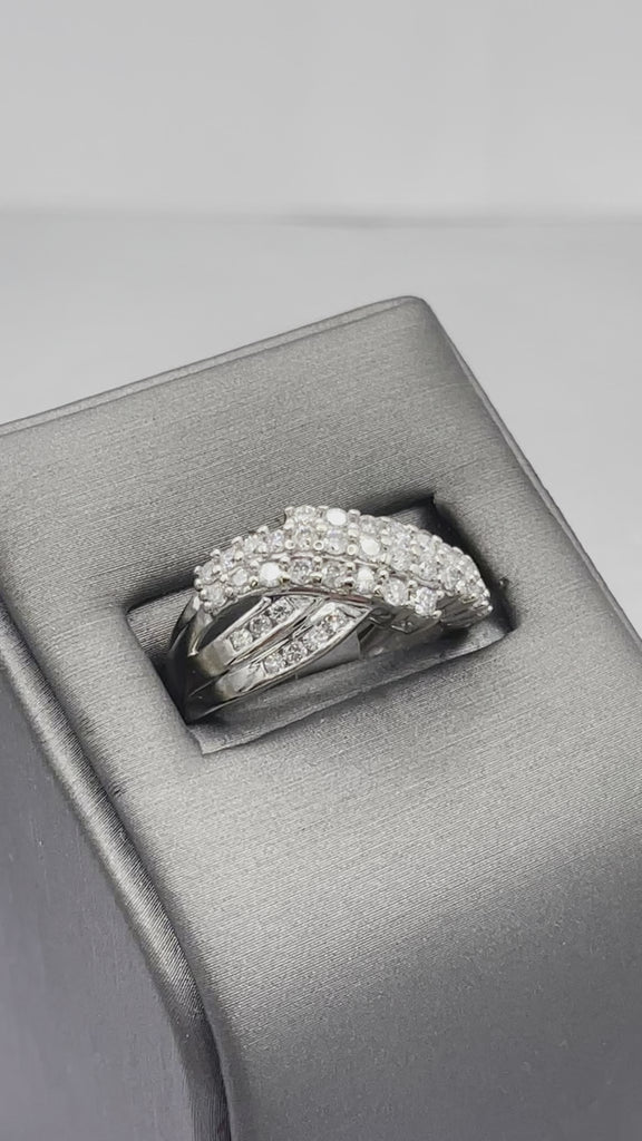 movie of 10 Karat White Gold Channel Set Criss Cross Design Diamond Ring