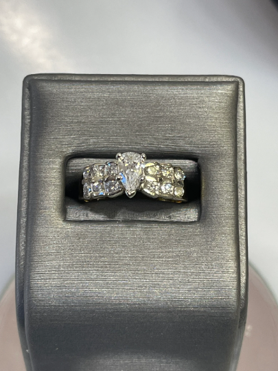 14 Karat Yellow Gold Diamond Engagement Ring 3 Step Diamond Accent Band W/ Center Pear Shape
